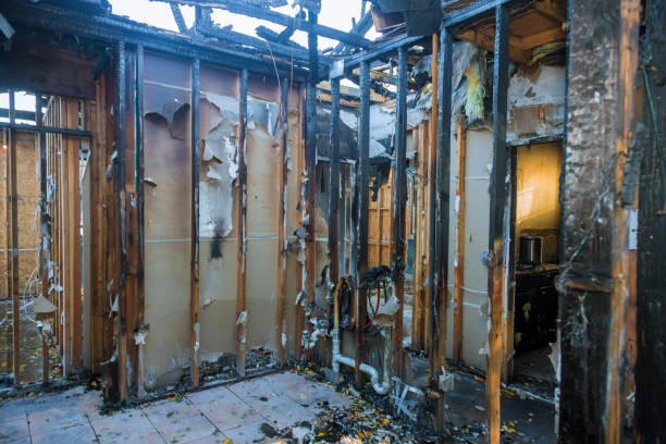 Professional Fire Damage Restoration technician working in Newport East, RI